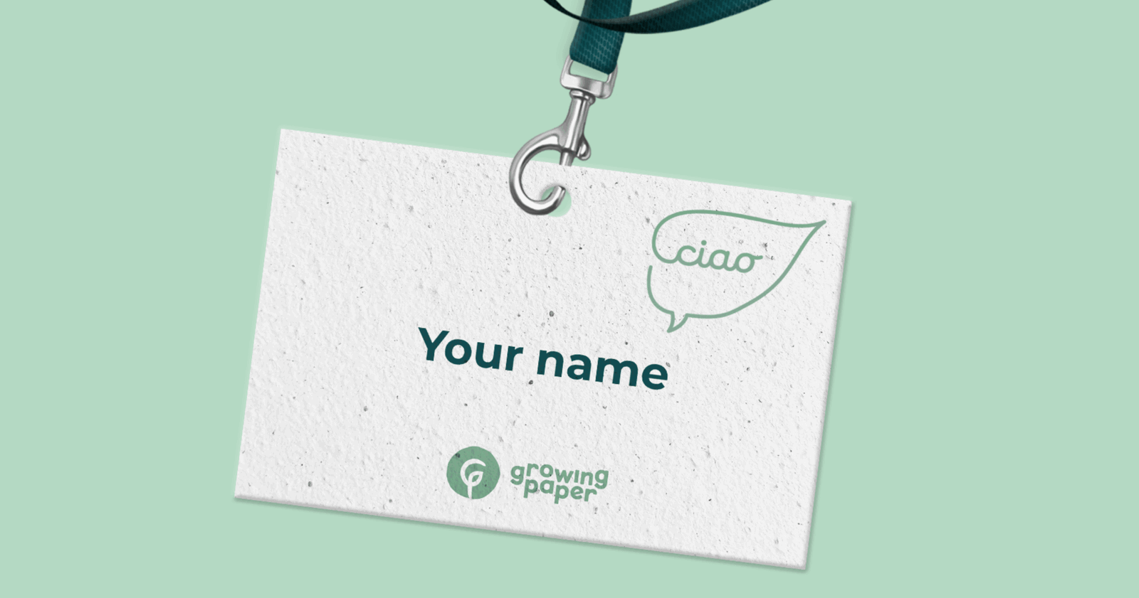 Name tag made out of growing paper with a green background