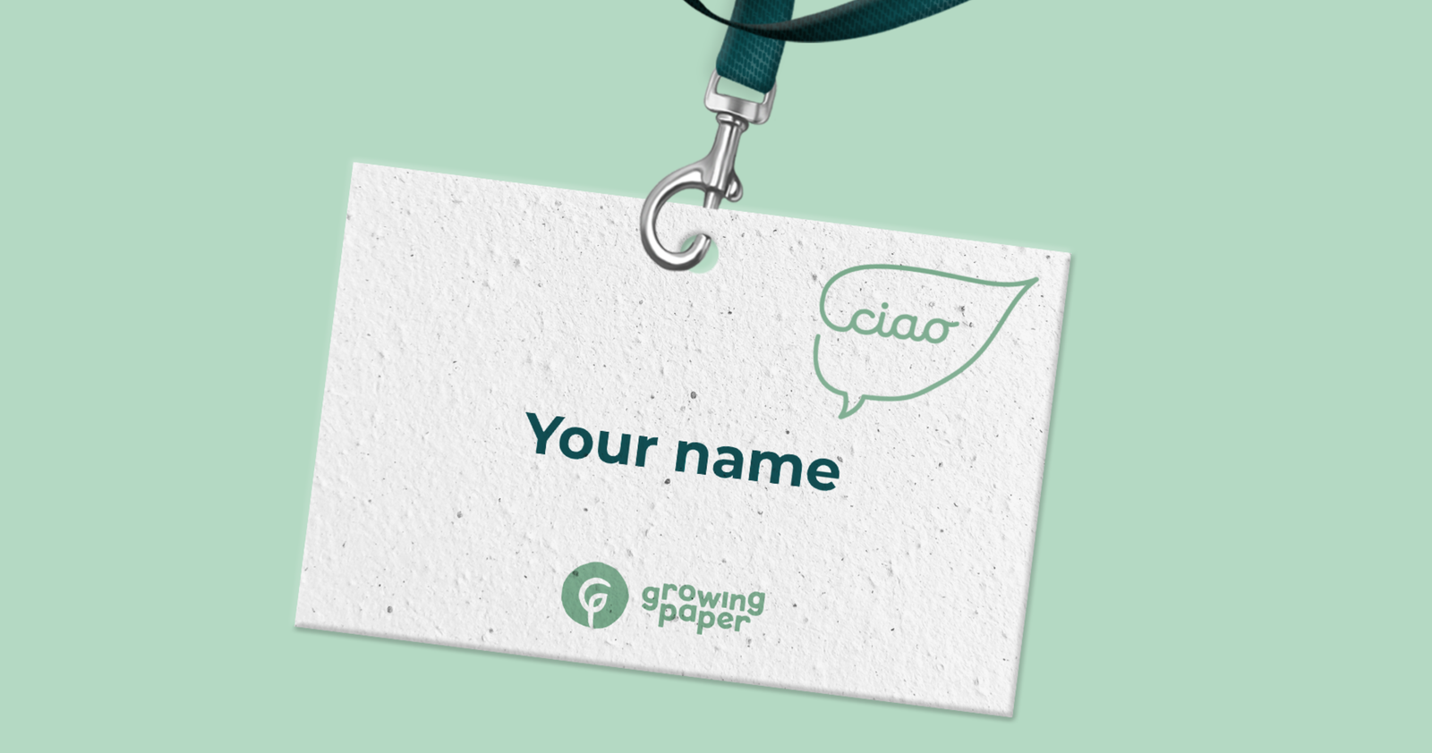 Name tag made out of growing paper with a green background