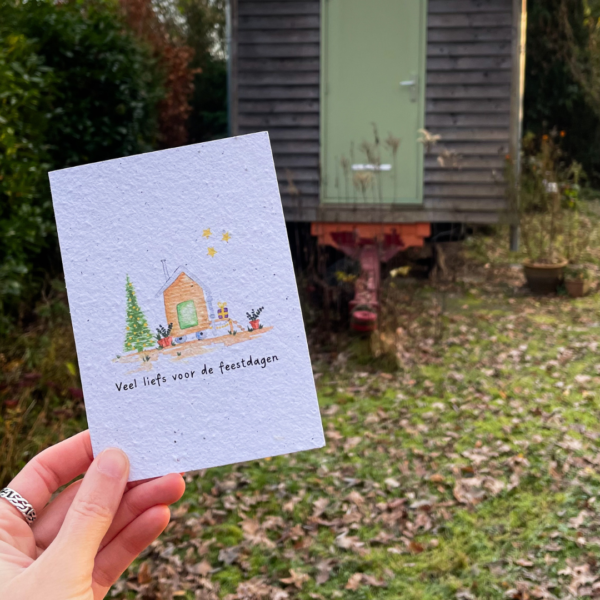 Tiny House Christmas card in front of the tiny house